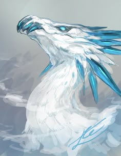 a white bird with blue feathers on it's head