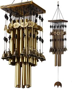 two wind chimes with bells hanging from them