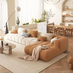 a living room filled with lots of furniture next to a tall white wall mounted clock