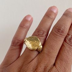 This shape is cast from a rock I found on the beaches of the Pacific Coast. The roundness and irregular shape envelop all the beauty that nature provides. Depending on casting, each rock will look completely unique with its own markings and character. Along the side of the ring, are hand-formed serpents. COMPOSITION 18K Recycled Gold 4 or 6 Ring Size Alternate sizes available upon request Wax Ring, Wax Carving, Rare Stone, Dope Jewelry, Exclusive Jewelry, Pacific Coast, Recycled Gold, Fashion Styling, Rock On