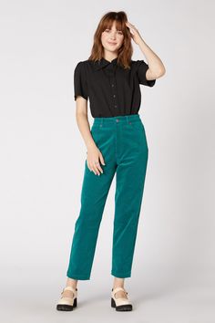 Elevate your everyday style with these High Waisted Tapered Cord Pants from Princess Highway. Crafted from soft cotton corduroy with a touch of elastane for added stretch, these pants provide both comfort and a flattering fit. The high-waisted rise accentuates your waist, while the tapered leg creates a sleek silhouette that pairs perfectly with any top. Featuring handy pockets for practicality and antique brass zippers and buttons for a vintage touch, these pants are as functional as they are s Teal And Magenta, Cord Pants, Gamine Style, Raincoat Kids, Princess Highway, Cords Pants, Vintage Clothes Women, Corduroy Fabric, Leggings Kids