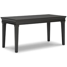 a black table sitting on top of a white floor next to a wooden frame and legs