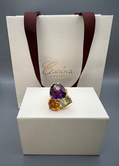 This beautiful handmade ring by Canova Jewelry is a perfect gift for any special occasion, whether it's for an engagement, wedding, anniversary, birthday or Valentine's Day. The ring features three natural gemstones, including a stunning purple amethyst as the main stone, along with citrine and green amethyst/prasiolite. The multicolor ring is made of 925 sterling silver and is designed with a cocktail style that showcases the beauty of nature and the luck and love that comes with it. The Ukraine-made ring is a unique piece of fine jewelry that is perfect for anyone who loves bohemian and magical themes. This piece is a true beauty that will surely captivate anyone's heart. Luxury Amethyst Rings With Gemstone Accents, Luxury Amethyst Ring With Gemstone Accents As Gift, Luxury Multi-stone Crystal Ring, Luxury Rings With Stones, Luxury Multi-stone Amethyst Ring For Weddings, Exquisite Diamond Ring With Gemstone Accents As Gift, Luxury Purple Multi-stone Sapphire Ring, Luxury Yellow Gold Rings With Stones, Luxury Multi-stone Amethyst Wedding Ring