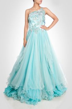 This stunning gown is in sky blue color. Three layers of net giving it stunning look. Inner layer is made of satin silk. Yoke is made of zardozi work in silver color. Customization accepted. Made to order Light Blue Floor-length Gown For Debutante Ball, Floor-length Organza Gown For Party Wear, Floor-length Organza Ball Gown For Reception, Elegant Light Blue Organza Gown, Blue Embellished Gown For Party, Blue Embellished Party Wear Gown, Blue Embellished Party Gown, Floor-length Tulle Gown For Reception, Festive Organza Gown For Prom