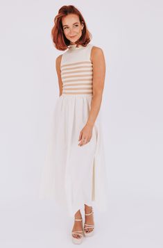 Get ready to set sail in style with our Sail Away With Me Dress! Featuring a ribbed knit bodice for comfort and a high neckline for a chic look. The contrasting fabrics add an extra touch of flair to this must-have dress. Perfect for any occasion, this dress will have you feeling confident and ready to conquer the day! Details Ribbed knit bodice High neckline Contrasting fabrics Sizing Approximate measurements: SIZE LENGTH BUST Small 53"﻿ 28"﻿ Medium 54"﻿ 30"﻿ Large 54"﻿ 32"﻿ Fabric has stretch Chic Ribbed Turtleneck Dress, Chic High Neck Ribbed Dress, Chic Spring Midi Dress With Ribbed Neckline, Spring Ribbed Turtleneck Dress, Summer Dress With Ribbed Neckline, Sleeveless Ribbed Midi Dress For Daywear, Chic High Neck Midi Dress For Daywear, Chic White High Neck Midi Dress, Casual High Neck Ribbed Midi Dress