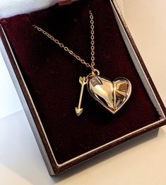 This charming puffed heart charm necklace is 18K gold plated and comes with an 18 inch 45cm curb link chain with a lobster clasp connector and contains a hidden secret message scroll inside the locket The necklace is customizable with a maximum of 30 letters for the front/back of the heart and 100 letters for the inside scroll Made from high-quality, 316L stainless steel which is hypoallergenic, fade and rust resistant, alongside being waterproof, making it ideal for all skin types  Material Det Gold Stainless Steel Heart Necklace For Valentine's Day, White Gold Stainless Steel Heart Pendant Necklace, Gold Double Heart Stainless Steel Necklace, Elegant Metal Locket Necklace For Valentine's Day, Valentine's Day Open Heart Metal Jewelry, Rose Gold Heart-shaped Stainless Steel Jewelry, Gold Stainless Steel Heart Necklace For Anniversary, Silver Stainless Steel Necklace For Valentine's Day, Gold Stainless Steel Open Heart Necklace