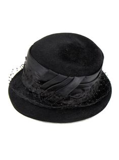 Black felt bucket-style hat with a short brim and a tall satin hatband with pleating detail and a swathe of black net. A versatile style to pair well with your other sixties pieces. Approx 21.5" internal circumference. Gatsby Style Short Brim Costume Hats For Evening, Evening Gatsby Costume Hat With Short Brim, Gatsby Style Mini Hat With Short Brim For Evening, Elegant Black Bucket Hat, Evening Gatsby Mini Hat With Short Brim, Elegant Black Bucket Hat With Short Brim, Black Vintage Fedora For Spring, Classic Cloche Hat With Curved Brim For Party, Black Cloche Hat With Short Brim For Party