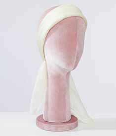 Exhibit your retro pin-up silhouette with this sweet treat from Unique Vintage! Crafted in a lightweight off chiffon, this hair scarf is perfect for tying up and around your divine 'do - any excuse for a little sky-high hair help!Available while supplies last