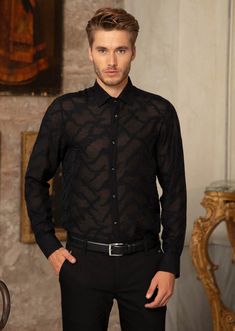 Your friends will see straight through you... partially sheer, this black Mondo shirt adds elegance and mystery that is emblematic of Mondo's freedom, empowerment and individualism Limited Edition Sheer custom fabric Semi-see through Custom metal square button French placket Button-down collar Long sleeves with rounded, single-button cuffs Rounded hem Cotton Dry clean suggested