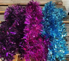 purple and blue tinsel christmas tree decorations