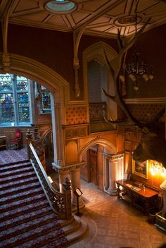 an ornate staircase leading up to the second floor