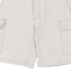 Vintage Unbranded white cargo shorts, fit a 34" waist and 11" inseam. WAIST: 34 inches / 86cmsINSEAM: 11 inches / 28cmsRISE: 12 inches / 30cmsGENDER: mens CONDITION: good - marks on front and back as shown.STYLE: cargo shortsERA: 1990sCOLOUR: whiteFABRIC: cotton White Summer Cargo Shorts With Pockets, White Summer Cargo Pants With Multiple Pockets, White Cargo Shorts With Built-in Shorts, White Cotton Cargo Shorts With Pockets, White Cotton Bermuda Shorts With Pockets, White Cotton Cargo Shorts With Built-in Shorts, White Summer Cargo Pants With Patch Pockets, White Cargo Pants With Patch Pockets For Summer, White Relaxed Fit Cargo Shorts