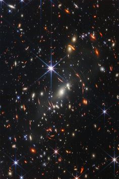 an image of many different stars in the night sky with bright lights and sparkles