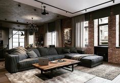 a living room filled with furniture and a laptop computer on top of a wooden table