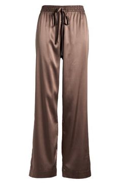 Elevate your evening routine in these ultrasoft satin pajama pants topped by a comfy elastic waist. 30" inseam; 20" leg opening; 12" front rise; 15 1/2" back rise (size Medium) Elastic/drawstring waist 62% polyester, 33% recycled polyester, 5% spandex Machine wash, tumble dry Imported Satin Pajama Pants, Satin Pajama, Evening Routine, Satin Pajamas, Fabric Gift Bags, Nordstrom Store, Free Fabric, Drawstring Waist, Pajama Pants