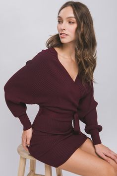 This Wine Off Shoulder Wrap Belted Ribbed Knit Dress is a timeless choice for casual occasions. Crafted from a lightweight ribbed knit fabric, it features an off shoulder design with a relaxed fit, an adjustable removable self tie belt, a front surplice wrap detail and a mini length bodice. Fabric & fit: 83% Viscose, 17% Polyester Model is wearing size Small Off Shoulder Design, Knit Wrap Dress, Pepper Color, Shoulder Wrap, Wrap Belt, Ribbed Knit Fabric, Ribbed Knit Dress, Holiday Looks, Shoulder Design