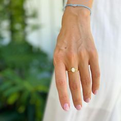 A dreamy and romantic opal ring featuring a round cut in a bezel setting and an elegant polished band in 14K gold plating over sterling silver.
A delicate vintage design and a glowing opal stone make this a truly unique piece. Adjustable White Gold Jewelry For Everyday Wear, Classic Stackable Jewelry Gift, Timeless Moonstone Promise Ring, Oval 14k Gold Jewelry Gift, Delicate Oval Solitaire Jewelry, Delicate Oval Solitaire Ring, 14k Gold Everyday Rings With Round Band, Everyday 14k Gold Round Band Ring, Everyday 14k Gold Oval Jewelry