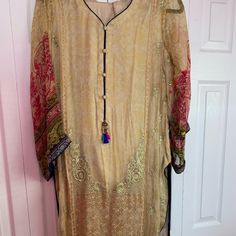 Pakistani Embroidered Chiffon Outfit Brand New. With Beautiful Embroidery And Finest Stitching. Can Be Worn As Party Wear To An Evening Get To Gather . Semi-stitched Gold Dress With Floral Embroidery, Bohemian Silk Kurta For Parties, Bohemian Silk Party Kurta, Gold Semi-stitched Dress With Floral Embroidery, Gold Long Sleeve Georgette Dress, Festive Embroidered Chiffon Dupatta, Bollywood Style Embroidered Chiffon Dress, Bollywood Chiffon Dress With Embroidery, Embroidered Long Sleeve Organza Dress