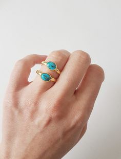 A beautiful turquoise gemstone set in a sterling silver bezel . Great for stacking! *Ring's band measure 3mm *The ring has been polished for a more elegant and chic look. *Choose your ring size during checkout!Every gemstone is unique as the person it will adorn. Please allow for small differences in color. *Also available in gold plated silver.Choose the finish you prefer during checkout! ------------------------------------------------------------------------------------ TURQUOISE PROPERTIES: Adjustable Turquoise Gemstone Jewelry, Adjustable Turquoise Ring Fine Jewelry, Everyday Bohemian Oval Jewelry, Elegant Adjustable Gold Turquoise Ring, Minimalist Gold Turquoise Gemstone Ring, Minimalist Turquoise Open Ring Jewelry, Spiritual Turquoise Jewelry For Everyday, Everyday Spiritual Turquoise Jewelry, Turquoise Stackable Dainty Jewelry