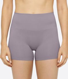 Compressive Shapewear Shorts, Mid-thigh Length Boxer Briefs With Built-in Shorts, Solid Color Workout Brief Shorts, Solid Color Brief Workout Shorts, Solid Shapewear With Built-in Shorts, Solid Seamless Short Shapewear, Solid Short Seamless Shapewear, Seamless Solid Short Length Shapewear, Seamless Construction Solid Color Shapewear Shorts