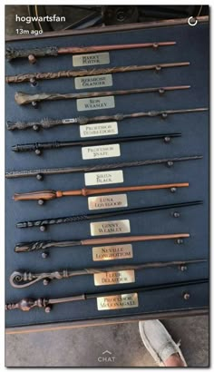 a display case filled with lots of different types of wands