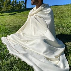 "-100% Merino Wool from Australian highlands and over 8' long by 4' wide. -Handcrafted in Himalayan region -Dry Clean or Handwash Cold only -White This meditation blanket is light-weight, cosy, and warm, being sourced from Merino sheep in the Australian highlands. This fine, most sought-after material is then handcrafted in the Himalayan region. The result is a soft, strong, high quality meditation blanket that is sure to make you feel peaceful and at home. It will also make a good car blanket, a throw blanket on your couch or bed, or a stylish oversize scarf that you can wear to keep warm. You can use it also as a baby blanket, a travel blanket on airlines, or a quality ethnic home décor. It is a perfect gift item. The special \"boxed\" design comes in only the one pattern that's pictured Meditation Blanket, Oversize Scarf, Meditation Shawl, Car Blanket, Merino Sheep, Travel Blanket, Wool Shop, Oversized Scarf, Wool Shawl