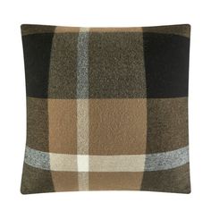 a brown and black plaid pillow on a white background