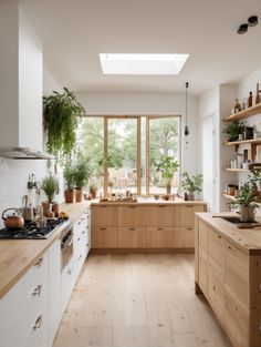 a kitchen filled with lots of wooden counter tops