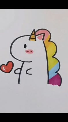 a drawing of a unicorn with a heart on it's nose and rainbow mane