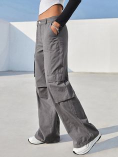 Introducing our Flap Pocket Cotton Cargo Pants, the ultimate combination of style and functionality. These pants are designed to elevate your wardrobe and provide you with a versatile and fashionable option for any occasion. Featuring flap pockets that add a touch of urban utility, these cargo pants offer ample storage space for your essentials while enhancing your outfit's overall aesthetic. Details: Type: Cargo Pants Closure Type: Zipper Fly Details: Button, Pocket, Zipper Waist Line: Natural Urban Wide-leg Pants With Pockets, Baggy Gray Cargo Pants With Pockets, Relaxed Fit Cargo Trousers With Multiple Pockets, Wide-leg Work Pants With Cargo Pockets For Streetwear, Outdoor Gray Cargo Pants, Relaxed Fit Full Length Cargo Pants With Pockets, Baggy Utility Cargo Pants, Baggy Straight Utility Cargo Pants, Urban Full Length Work Pants With Side Pockets