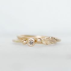 "Sweet little \"Leaf and Flower Bud\" stacking ring in 14k OR 18k gold. Wear it alone for a minimalist look or stack it up! Details: *Band - 1.3mm, hammered (Also available in 1.6mm) *Gold - 14k yellow or Rose *18k gold also available. Price on request Made to order. Please let me know the ring size you would like in the \"Message to seller\" section when you check out. Thanks for looking! Lilian" Delicate Stackable Yellow Gold Flower Ring, Delicate Yellow Gold Stackable Flower Ring, Stackable White Gold Rings Made Of Recycled Gold, Delicate 14k Gold Stackable Flower Ring, Delicate Yellow Gold Stackable Rings With Bezel Setting, White Gold Stackable Promise Rings In Recycled Gold, Gold Nature-inspired Stackable Promise Rings, Nature-inspired Gold Stackable Promise Rings, Recycled Gold Nature-inspired Promise Ring