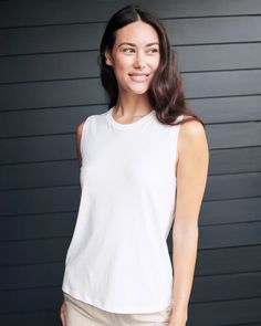 Cotton Modal Muscle Tank Cotton Tank Tops Athleisure Style, Summer Organic Cotton Washed Tops, Basic Washed Organic Cotton Tops, Versatile Soft-washed Cotton Top, Basic Washed Cotton Top, Relaxed Washed Tops For Summer, Casual Cotton Stretch Muscle Tee, Cotton Solid Color Tank Top For Loungewear, Casual Organic Cotton Tank Top For Spring