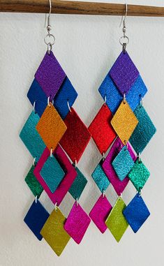 Iridiana Earrings - These are big, bold and absolutely beautiful.  They make me feel so happy when I put these on and instantly brighten up any outfit.  Not only are they colorful and fun to wear they really are visually stunning! Definitely head turners these beauties. Large, lightweight, statement earrings Diy Resin Mold Release, Bohemian Wedding Earrings, Textile Earrings, Colourful Earrings, Diy Leather Earrings, Earrings Chandelier, Paper Earrings, Fabric Earrings, Earrings Colorful