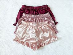 LISTING IS FOR A PACK OF 3 Gorgeous, silky soft satin adult pajama shorts that are perfect all year round! A perfect pair to wear while lounging around the house. Great for birthday gifts, Christmas gifts, Valentine's Day, or even Bridal parties! Comes with a stretchy elastic waistband for a comfort. Cute ruffle trim finishes off the shorts. 100% Satin If interested in only one satin pj short, you can purchase here: https://www.etsy.com/listing/1168950451/loungewear-satin-ruffle-trim-shorts?clic Short Satin, Pyjama Satin, Party Photoshoot, Pj Shorts, Satin Shorts, Adult Pajamas, Pajama Bottoms, Pajama Shorts, Sleepwear Women