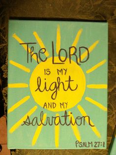 the word is my light and my salvation written on a blue canvas with yellow rays