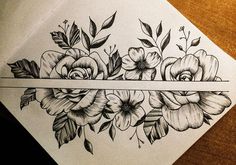 a pencil drawing of flowers and leaves on a piece of paper with a tape in the middle