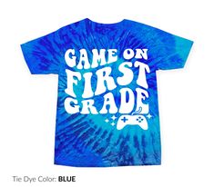 Blue Graphic Print T-shirt For School Events, Blue Pre-shrunk T-shirt For School Events, School Spirit T-shirt For Birthday And Back To School, Game Day Blue Pre-shrunk Shirt, Blue Pre-shrunk Shirt For Game Day, Blue Short Sleeve T-shirt For Daycare, Blue Custom Print T-shirt For College, Blue Graphic Print Shirt For School, School Spirit Shirt With Slogan For School