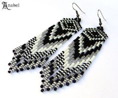 two pairs of black and white beaded earrings on a white background with the words arabel written below it