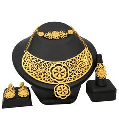 Indian Gold Plated Jewelry Sets Wedding Dubai Choker Necklace Bracelet Earring Ring Nigerian Bridal Set African JeweleryModel Number:1005003058985413 (1) Necklace approx :43cm +5cm. Bracelet approx :19.2cm .One set includes 1 Necklace,1 Bracelet,a pair of Stud Earrings and a Ring. (2) When you go to a banquet, necklace suit will match your dress very well, highlighting your temperament; when you go to a dance party, it will make you look more mature. (3) The jewelry set is packed with a box.Idea Gold Alloy Wedding Jewelry, Plated Alloy Wedding Jewelry, Wedding Alloy Plated Jewelry, Wedding Jewelry With Metal Plating, Gold Plated Bridal Sets Gift, Round Plated Jewelry For Wedding, Gold Plated Round Bridal Sets As Gift, Plated Round Jewelry For Weddings, Gold Bridal Sets Gift