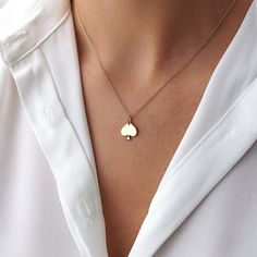 Our simple plain polished gold spade necklaces. As always we craft our pieces with solid gold so you can enjoy your piece indefinitely.★ Necklace Features • Gold Kt: 14K Solid Gold (stamped for authenticity) • Available Gold Colors: Yellow Gold, White Gold, Rose Gold• Pendant Dimensions: 12.1 mm by 11.25 mm / 0.48 Inch by 0.44 Inch Spade Necklace, Gold Diamond Earrings Studs, Statement Rings Diamond, Diamond Huggies, Emerald Bracelet, Pendants Necklaces, Rose Gold Pendant, Gold Ring Stack, Gold Colors