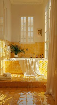 a bath room with a tub and a window