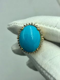 Turquoise Gold Ring, 14k Gold Ring, Oval shape with diamond Ring Promise Ring, Oval Turquoise Ring, Sleeping Beauty Ring, Anniversary Ring 💍  *Gemstone: Natural Arizona Sleeping Beauty Turquoise *Metal:  14K Rose Gold/14K Yellow Gold/14K White Gold *Gemstone Shape and Size: Oval 13X19 MM *Gemstone Shape and Size: Round Diamond  *Gemstone Weight: 16.00 Carat. Every Piece of Jewelry we make has a special meaning and story. Oval Turquoise Jewelry With Diamond Accents, Turquoise Oval Jewelry With Diamond Accents, Luxury Turquoise Diamond Ring, Turquoise Oval Ring With Halo Setting, Turquoise Diamond Ring With Center Stone, Oval Multi-stone Turquoise Ring, Oval Turquoise Multi-stone Ring, Fine Jewelry Turquoise Ring With Diamond Accents, Gift Diamond Turquoise Cabochon Ring