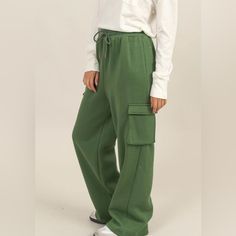 Woman’s Comfortable High-Waist Drawstring, Cargo Sweatpants Size: Various Green High-Waist Relaxed Fit Side Cargo Pocket Drawstring Waistband Polyester, Cotton New In Package Stay Comfortable And Stylish With These Cargo Sweatpants. Featuring A Relaxed Fit, Drawstring Waistband, And Functional Cargo Pockets, These Pants Are Perfect For A Casual Day Out Or Lounging At Home. Pair With Your Favorite Top And Sneakers For An Effortless Look Sporty High-waisted Pants With Drawstring, Sporty High-waisted Drawstring Bottoms, Green Athleisure Parachute Pants With Pockets, High-waisted Leisure Sweatpants With Pockets, Green Relaxed Fit Sweatpants With Drawstring, Green Lounge Pants With Side Pockets, Relaxed Fit Green Sweatpants With Drawstring, Green Utility Pants With Drawstring, Leisure High-waisted Sweatpants With Pockets