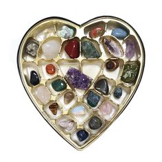 Make it a gift to remember with our Lovestruck crystal heart box!Give a gift that lasts forever as each heart box comes with 27 stones and crystals. While taking a play on the classic candy heart shaped boxes, ours is 100% gluten-free, vegan-friendly with zero calories!Perfect for any occasion where you want to express your love and creativity with someone special. This is truly a unique gift that no one would expect but would definitely enjoy and remember for lifetimes.Features:◖ Arrives comple Rock Collection Display Ideas, Crystal Heart Box, Rock Collection Display, Heart Shaped Boxes, Crystal Identification, Rock Gifts, Classic Candy, Crystal Aesthetic, Crystal Box