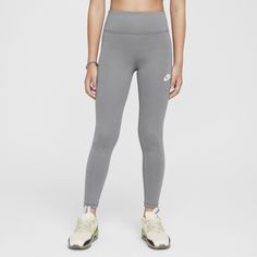 There's a reason we call these our Classic leggings. A staple for everyday wear, they're made from fabric that's thick but still lightweight, peachy-soft but still strong. Plus, they stretch with your every move and feature a high-waisted design to help you stay comfortably covered. Nike Leggings For Sports, Nike Solid Color Sports Leggings, Nike Tight Sporty Leggings, Nike Sporty Tight Leggings, Nike Tight Sportswear Leggings, Nike High Stretch Casual Yoga Pants, Nike Casual High Stretch Yoga Pants, Casual Sports Leggings With Snug Fit, Casual Snug Fit Leggings For Sports