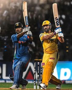 two men in yellow and blue uniforms playing cricket