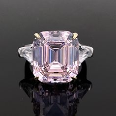 Personally Designed MEGA pink topaz ring in emerald cut, set with two white topaz side gemstones in fine (solid) British sterling silver that is polished to perfection. It has a bright finish and it doesn't tarnish. 💎 Gem Stone: Natural Pink Topaz 14*16mm 💎 Gemstone Shape: Octagon with Emerald Cut 💎 Material: Sterling Silver version is in stock for immediate dispatch, but all gold and platinum versions are made to order, taking approximately 4 weeks for me to complete. 💎 Band Size - please m Pink Diamond Rings, Pink Rings, Eiffel Tower Painting, Pink Topaz Ring, Lab Diamond Engagement Ring, Cluster Rings, Pink Topaz, Luxury Rings, Pink Gemstones