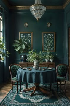 a dining room with dark green walls and wooden furniture, potted plants on the table