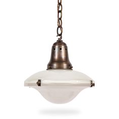 an old fashioned light hanging from a chain on a white background with clippings