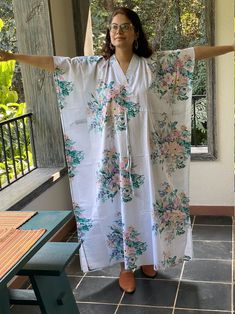 I made this Kaftan from a beautiful floral pattern in 100% mulmul cotton. Mulmul is a very fine variety of cotton which is extremely soft and it gets softer with every wash. It is so free flowing, that it will make you feel as if you aren't wearing anything at all ;) The beauty of the Kaftans is they will fit everyone so no need to worry about the size et all. All my Kaftans have deep necks(11-12 inches) so will fit all head sizes. However, the length of my kaftans will vary. I make all my kafta Summer Sleepwear Kimono With Prints, White Floral Print Sleepwear For Relaxation, Bohemian Cotton Sleepwear With Prints, Long Cotton Summer Sleepwear, Long Cotton Sleepwear For Summer, Summer Floral Print Kimono For Sleep, Summer Floral Print Sleep Kimono, Printed Summer Robe For Home, Summer Printed Robe For Home